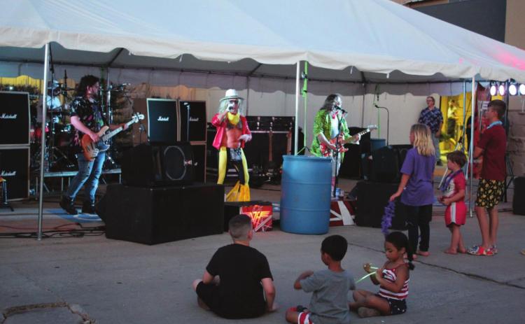 Next Halen performs during FireLake Casino’s Independence Day event on July 3. They are, from left, Johnny Johns, on drums; Darek Johns, on bass; Dan Halen, lead vocals; and Drew Sevier, on guitar. Countywide & Sun/Natasha Dunagan