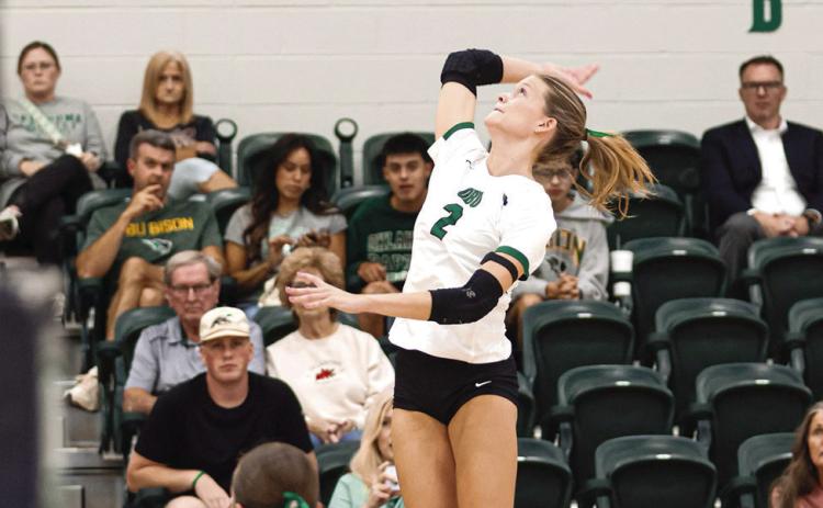 OBU's Lauren Safrit knocks one over against SWOSU. Photo Provided