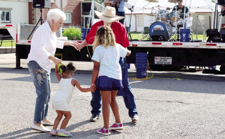 Block Party. File photo Kids of all ages enjoy some dancing at the 2023 Mingle on Main Street