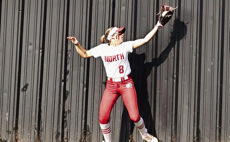 North Rock Creek's Aubree Shivelhood make a catch at the wall. Photo courtesy of Gowin Photography