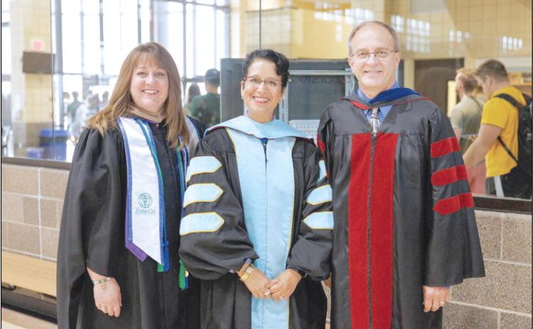 OBU presented its highest employee awards during Convocation on Aug. 30. Jana VanderTook, from left, received the Meritorious Service Award, Dr. Lyda Murillo Wilbur, associate professor of Spanish, received the Promising Teacher Award and Dr. Tony Yates, professor of science, received the Distinguished Teaching Award. Photo provided by OBU
