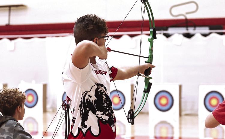 North Rock Creek’s archery team cleaned up this weekend at the NRC Winter Shootout, sweeping every trophy, Elementary, Middle and High School divisions. One of the top NRC HS shooters was Brodie Grace with a 282. Photo courtesy of Gowin Photography