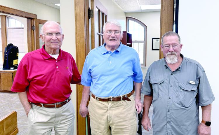 Bill Ford, Fred Turner and James Bryce pose for a photo after Turner's presentation at the Veterans Museum about his uncle, Corporal Harold L. Turner who earned a Medal of Honor in WW1. Julie Talton, Countywide &amp; Sun