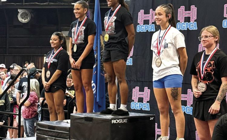 Bethel High School's Stohri Rhynalds, fourth from left, placed third in the OGPCA State Powerlifting Meet, held in Durant on March 2, with a 600-pound total in the large schools, 113-pound weight division. She is the first in Bethel girls powerlifting to place at the state competition, said Coach Joey Ginn. Photo provided