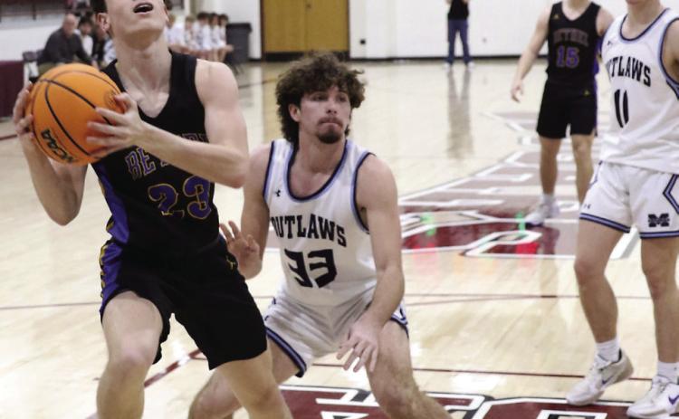 Bethel's Darius Cheatham aims for the bucket in the Area Round 1 game against Marlow on Mar. 6 in Chickasha. Bethel lost, 31-44, to end their season. Photo Courtesy of Kent Bush
