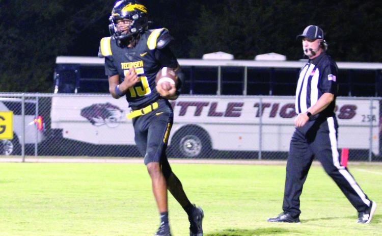 Tecumseh junior Sylis Grayson recovers after making a touchdown during the fourth quarter of the Oct. 16 home game against Tuttle. The Savages lost 6-70. Natasha Dunagan, Countywide &amp; Sun
