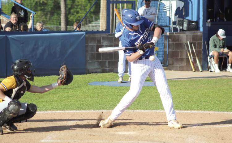Bethel freshman A.J. Carpenter hits a single during the first inning of the home game with Tecumseh on April 21. Also shown is Tecumseh catcher Caleb Sparks. Countywide &amp; Sun/Natasha Dunagan