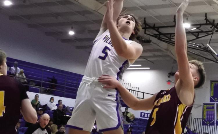 Bethel’s Garren Sheppard shoots for two in action Thursday, Dec. 12 at Bethel’s First United Bank Tournament. The Wildcats lost to Blanchard 28-61, and Tecumseh 71-52. The team rebounded Saturday with a hard-fought 49-46 win over Perkins-Tryon. Countywide & Sun/Suzie Campbell