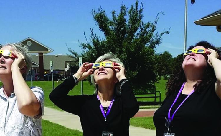 Blanchard Public Library staff view the August 2017 eclipse. Photo provided by Pioneer Library System