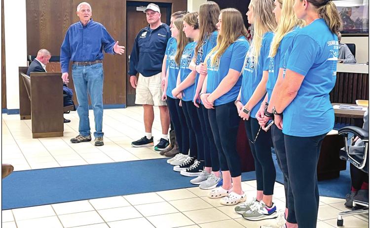 Mayor Ed Bolt introduces Shawnee High School Women’s Swim Team. The team was also presented a certificate in honor of their State Championship win during the Shawnee City Commission meeting held Monday, Mar. 21.
