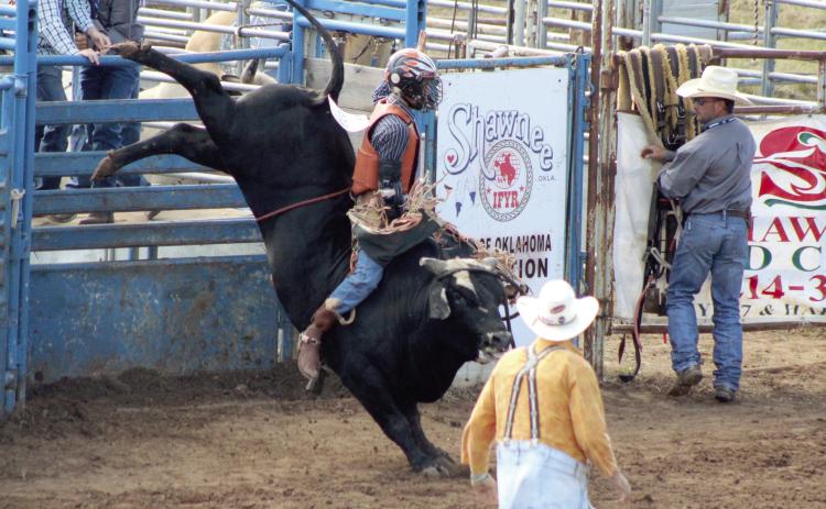 Hayden Averitt, of McLoud, breaks out of the chute on his bull during the International Finals Youth Rodeo on July 7, 2024. File photo