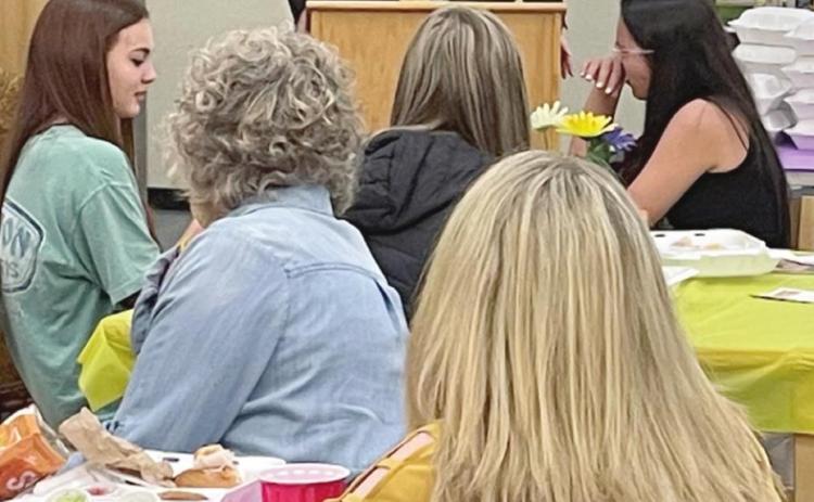 Tecumseh Superintendent Robert Kinsey opens the luncheon with high school students interested in a teaching career. Photo provided