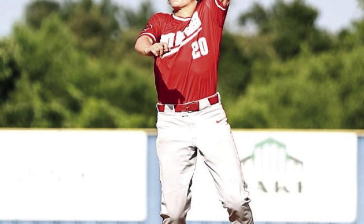 North Rock Creek’s Hunter Bertram leaps for the ball in action June 11 against Bethel in the summer league game.