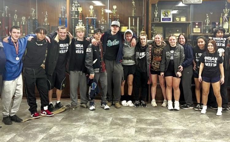 The Asher Powerlifting Team poses after a meet at Strother, Jan. 27. It was during that meet that senior Brogan Culwell became the first official member of the 1000-Pound Club. Photo provided.