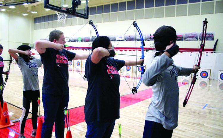 North Rock Creek students Braden Hibler and Callie Haney, second and third from left, compete in the NASP Tournament, held at NRC Jan. 13-14. Countywide &amp; Sun/ Natasha Dunagan