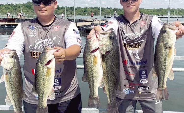 Tecumseh Savage Fishing Team of Alex Hurst, left, and Maddox Dickson pose with their catch from one of the days of fishing during the Oklahoma High School Fishing Championship tournament. The team placed 5th and will compete in the Angler Federation National Tournament at the end of this month. Photo provided