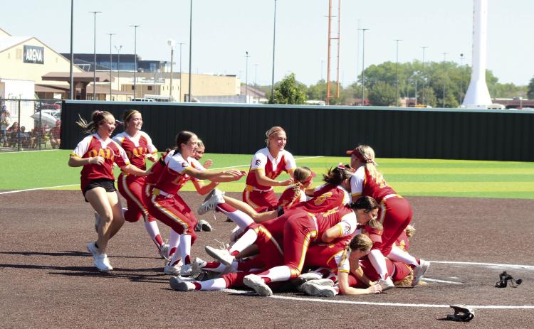 The Dale Lady Pirates Fast Pitch team celebrate with a dogpile after getting the third out in the eighth inning of the Class 2A Fast Pitch State Championship at FireLake Ball Fields on Oct. 10. The Lady Pirates conquered Crescent, 11-2, in the quarterfinals on Oct 8; were victorious over Vanoss, 5-4, on Oct. 9; and won over Warner in the Championship, 4-2, in an extra inning. They end the season with a record of 39-4. See more photos on page B1. Natasha Dunagan, Countywide &amp; Sun