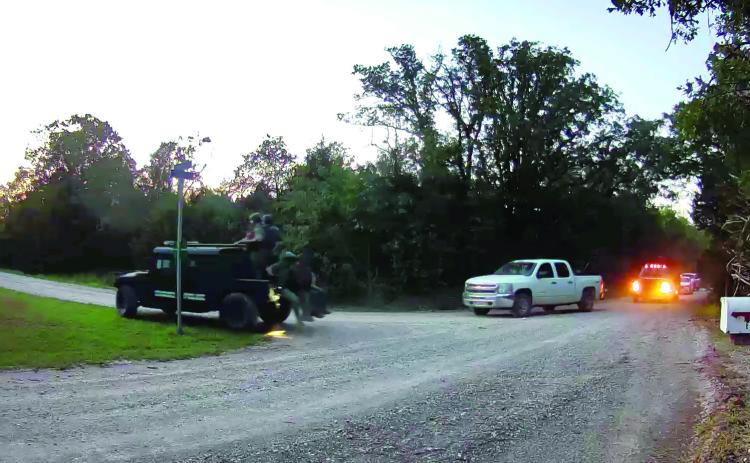 With no sirens or flashing lights and led by the Shawnee PD Tactical Team, investigators and officers turn onto Turtle Bay Rd to execute a search warrant. Drug parapharnalia and controlled dangerous substances were found at the residence.