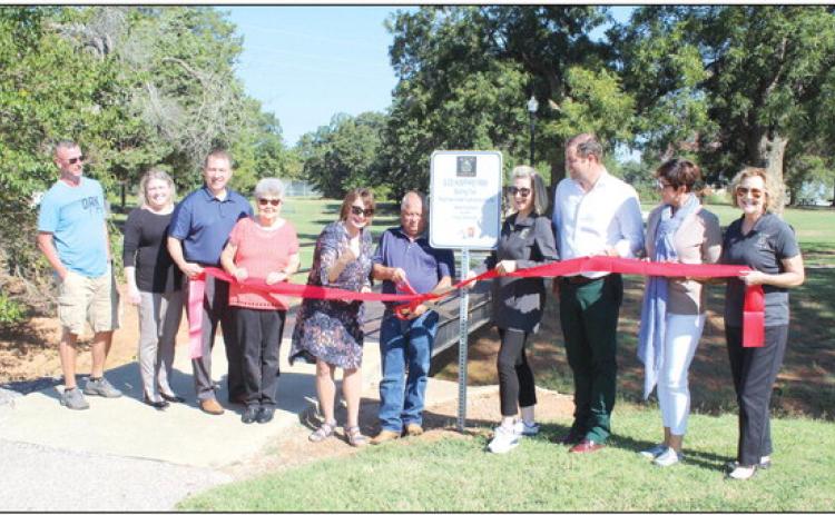 A ribbon is cut by Tecumseh City Manager Jimmy Stokes
