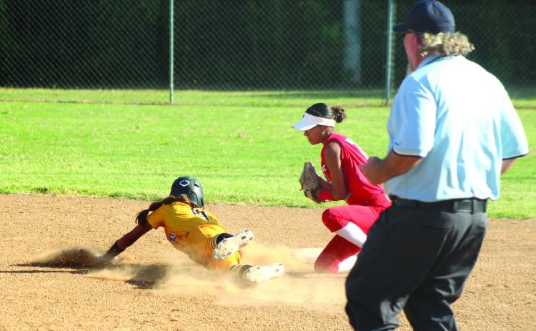 Earlsboro senior Molli Bustos guards second base as a Roff runner dive towards it during the first inning of the Aug. 13 home game. The Lady Wildcats lost 0-15. Photos by Natasha Dunagan, Countywide & Sun