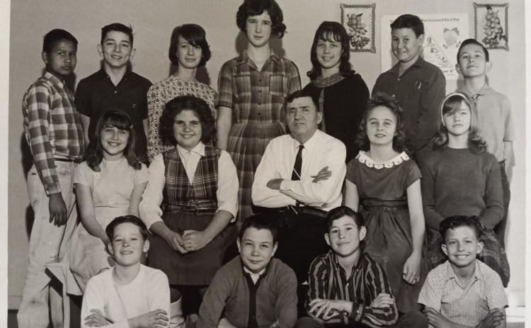 Former New Hope School student Beverly (Reaves) Kieffer said Mr. Lee Nevilles was one of her favorite teachers. He taught from 1962-1968. Shown, front row from left, are J.W. Miner, Ricky Timperley, Eddie Sherwood, Terry Dodson, middle row, Dorthy Annanders, Cindy Wiggins, Nevilles, Viola DeWitt, unknown, back row, Rocky Blanchard, Charles Annanders, Cathy Carpenter, Debbie Chastain, Ethel Dodson, Harold Yates and Willie Carpenter. Photo from the Collection of Glenn Dale and Kathryn Carter.