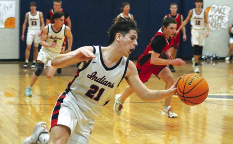 Asher’s Gunnar Lehman steals the ball and takes it to the hoop for two points during the Senior Night home game with Stratford, Feb. 2. The Indians lost 49-51, but they will go on to play in District 3 competition at 7:30 pm, Feb. 10, at home. Countywide & Sun/Natasha Dunagan