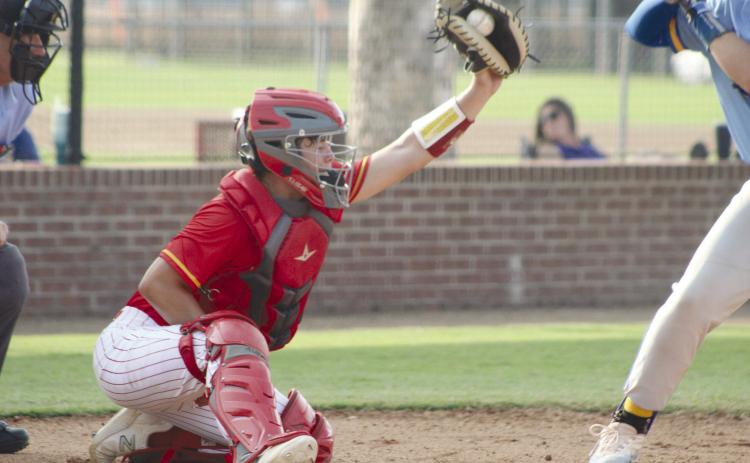 Dale senior Ethan Douglas reaches for the catch during the first inning of the Aug. 18 Arapaho-Butler game. Dale won, 10-0. Countywide & Sun/Natasha Dunagan