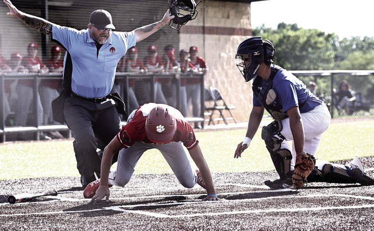 Brody Streber beats the throw and scores. for North Rock Creek in their first summer league game on May 26 against Bridge Creek, winning 7-2. Photos Provided by Gowin Photography