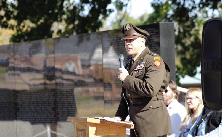 Lt. Col. Jakim Finlay, OK Army National Guard Commander of 1-179 Infantry Battalion, speaks about the late Major Cecil Johnson during the Pottawatomie County Veterans Memorial and Museum Veterans Day Program, held at the Woodland Veterans Park on Nov. 11. Countywide & Sun/Natasha Dunagan