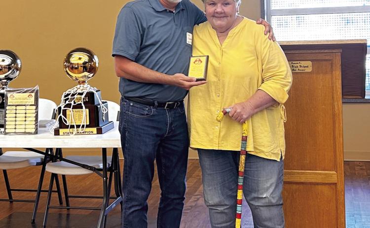 Troy Flewallen, 1986 Dale graduate, presented Donna Hampton 1966 graduate, with one of the first Pirate Pride awards during the banquet held Saturday, June 22. Countywide &amp; Sun/Suzie Campbell
