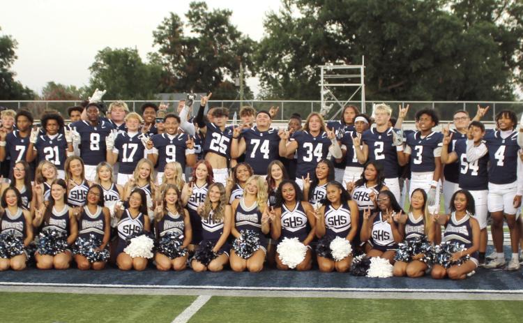 The Shawnee High School Football Team and Cheerleaders pose for a group photo during the "Meet the Player Night and Media Day" at Jim Thorpe Stadium on Aug. 15. Photos by Natasha Dunagan, Countywide & Sun