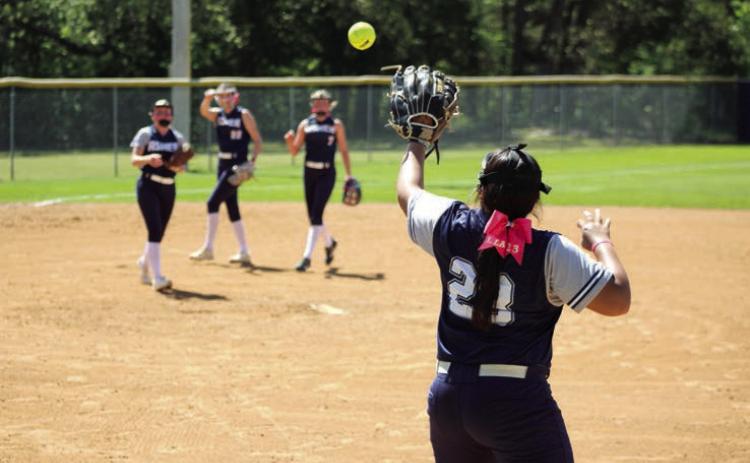 Asher freshman Raina Timms makes the catch at first base ahead of the runner during the Class B District home game against Achille on April 22. Natasha Dunagan, Countywide & Sun