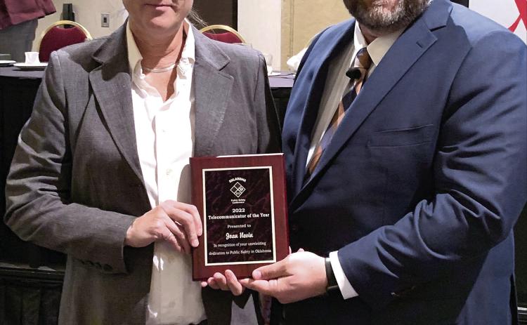 CPNPD dispatcher Joan Nevin accepts the Telecommunicator of the Year award for her exceptional focus and calm demeanor on the job. (Photo provided)