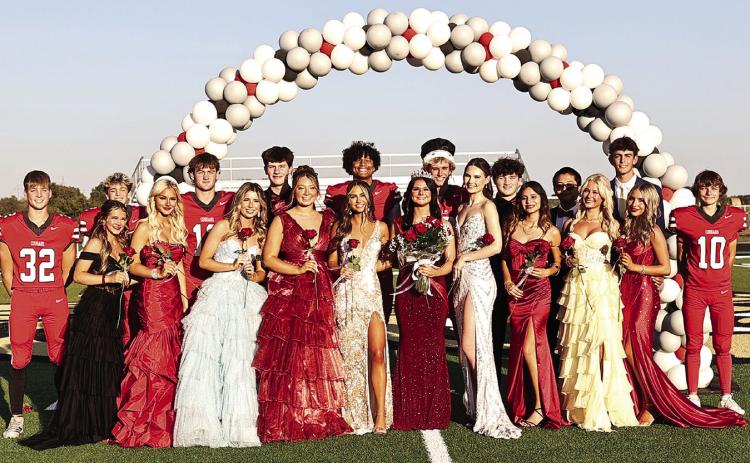 NRC homecoming queen and king, Elektra Coughran and CJ Stephens are surrounded by their court. Photo Courtesy of Gowin Photography