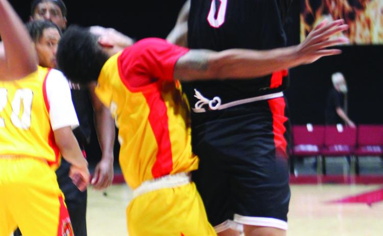 Potawatomi Fire Guard Deshawn Munson throws up a shot and makes it in the second quarter of the home game with the Shreveport Mavericks, March 31. The Fire won, 131-106. Countywide & Sun/Natasha Dunagan