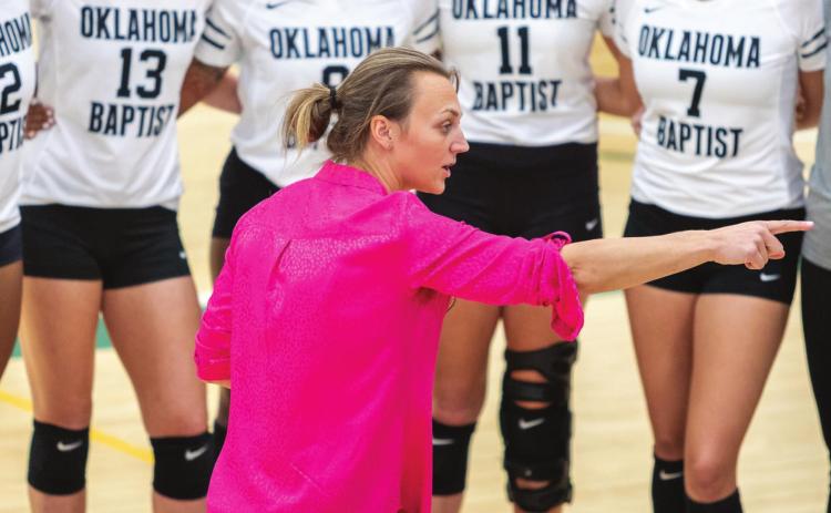 Oklahoma Baptist University Volleyball coach Anna Howle goes over the game plan with players. Photo provided