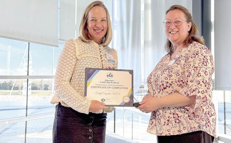 Seminole State College STEM Division Chair Emily Carpenter (left) recently completed the University of Central Oklahoma’s Educator’s Leadership Academy. Dr. Elizabeth Albright (right), Chair of the School of Education and Behavioral Sciences at Langston University and ELA Advisor, presented Carpenter with a certificate of completion. Photo provided by SSC