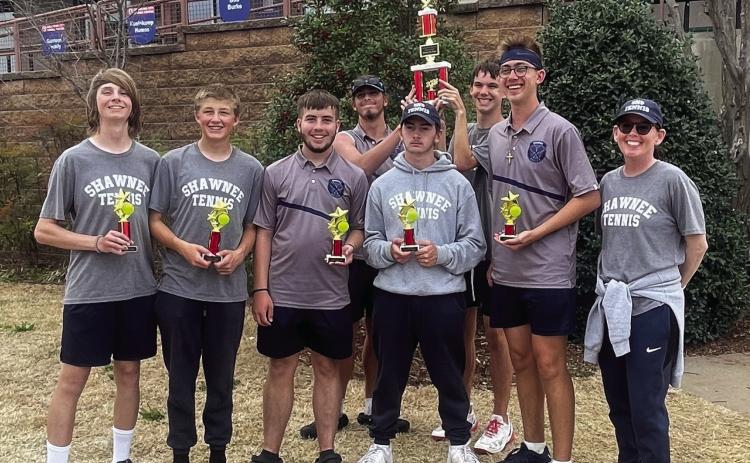 The Shawnee High School Boys Tennis Team took second place at the Western Heights Tournament, March 30. The Wolves also placed individually. They are shown with their Coach Dacia Jordan, far right. Photo provided.