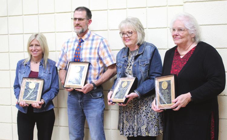 The Lola C. Durham Award was presented to Tammy Masoner, Barnard Elementary; David Axton, Tecumseh Middle School; Gayla Higgins, Tecumseh High School; and Murna Lack, Cross Timbers Elementary, during the Tecumseh Chamber of Commerce Teacher’s Luncheon on April 8 at the Tecumseh City Hall Auditorium. Countywide &amp; Sun/Natasha Dunagan