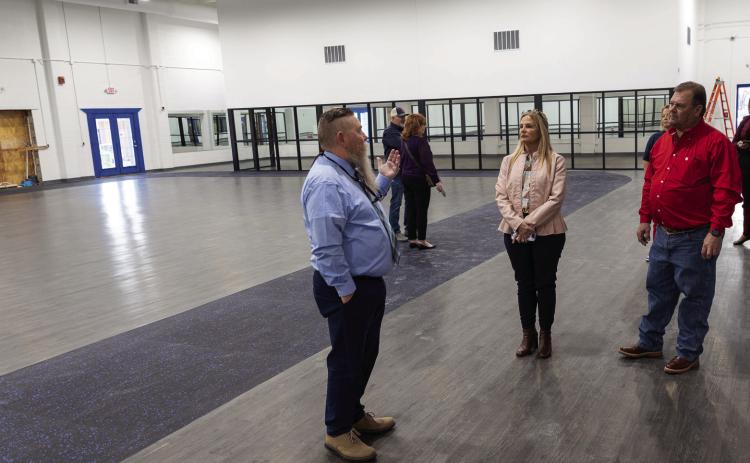 Following the Seminole State College Board of Regents Meeting on Feb. 15, regents and college employees toured the wellness center to see the progress on its construction. Pictured (left to right): Vice President for Student Affairs Dr. Bill Knowles, Regent Robyn Ready and Regent Curtis Morgan.