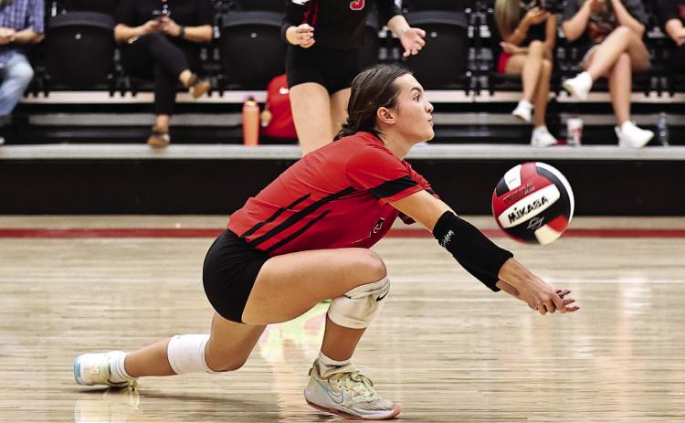 The North Rock Creek Volleyball Team swept Tishomingo in all three matches, Freshmen, JV, and Varsity on Aug. 18. Thursday (today) they will take on Bethany at home. Jaynie Ford goes low to set up the play.