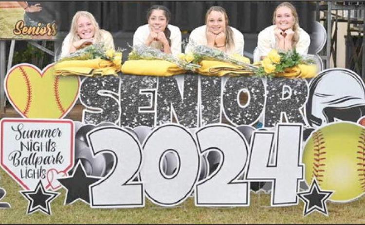 Tecumseh High School held their Fast Pitch Senior Night ceremony during the varsity game on Sept. 11. It was held in the Alumni Building due to stormy weather. Shown, from left, are Grace Wright, Serenity Jacoway, Khylei Daniels and Samantha Schweighardt. Photo provided by Kenetta Lisenbee.